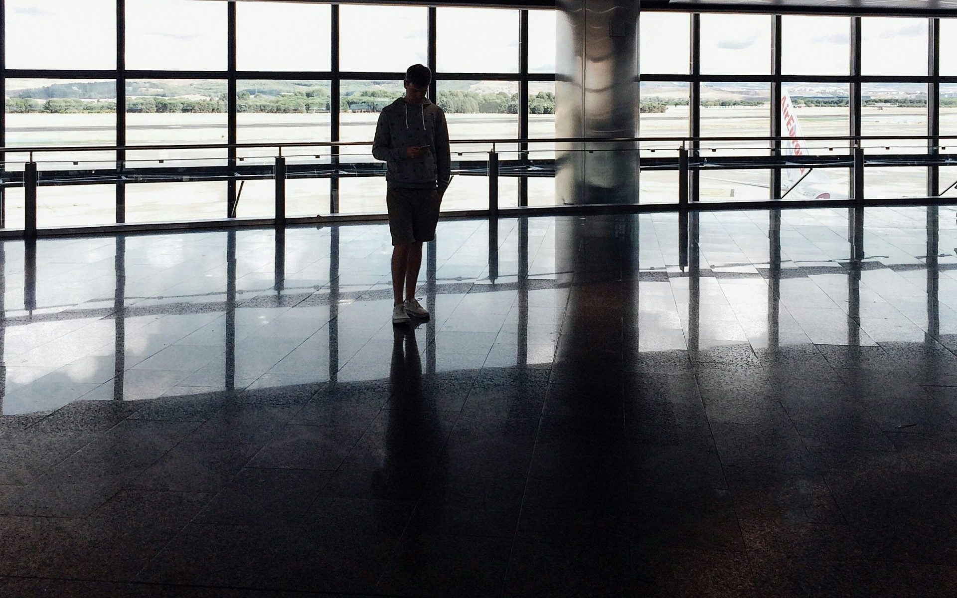 silhouette photo of person inside building